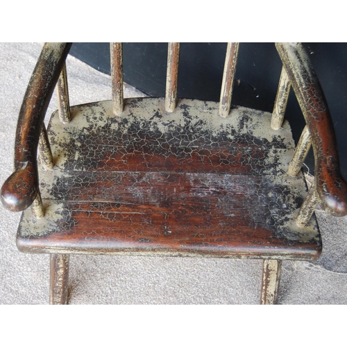 398 - Primitive Welsh style stick back chair, the stepped top rail over serpentine arms and solid seat, ra... 