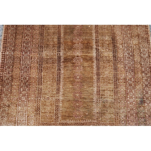 402 - Prayer mat with triple mihrab panel over mihrab, group border, faded red ground, 137cm x 68cm.