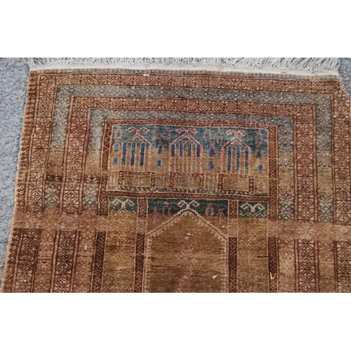 402 - Prayer mat with triple mihrab panel over mihrab, group border, faded red ground, 137cm x 68cm.