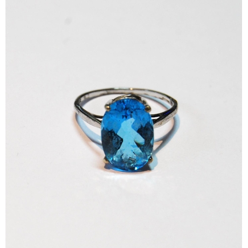 41 - Blue topaz ring in 9ct white gold, size R½.