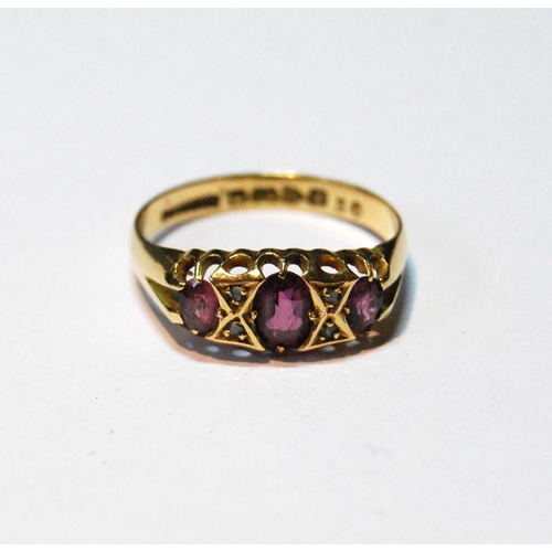 43 - 18ct gold ring with three amethysts and diamond points, Chester 1912, size Q, 3g.