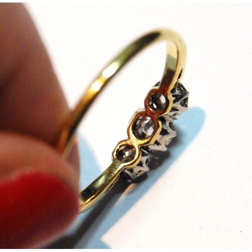 46 - Diamond three-stone ring '18ct Plat', size Q½.