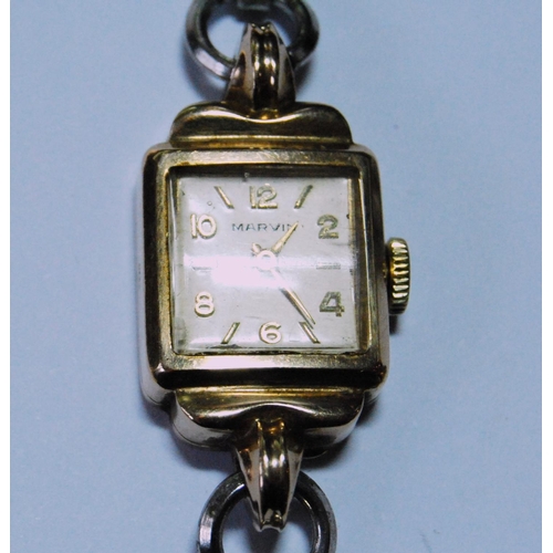 50 - Lady's Marvin 9ct gold watch, 1955, on strap and four other items.  (5)
