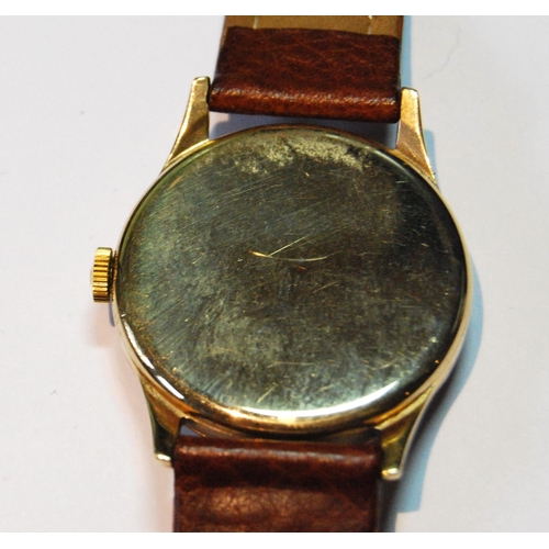 58 - Gent's Omega watch, model 265, no. 11770004, with silvered dial in 9ct gold case, snap back, 1975.