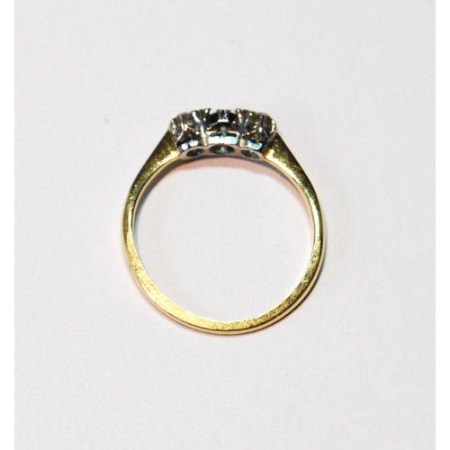 60 - Diamond and sapphire three-stone ring '18ct Plat', size M½, 2g.