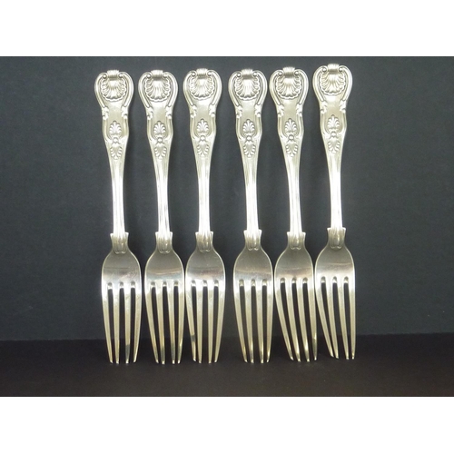 9 - Set of six silver table forks, Kings pattern, crested, by Peter Weeks, Dublin 1838. 21oz.