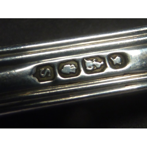 9 - Set of six silver table forks, Kings pattern, crested, by Peter Weeks, Dublin 1838. 21oz.