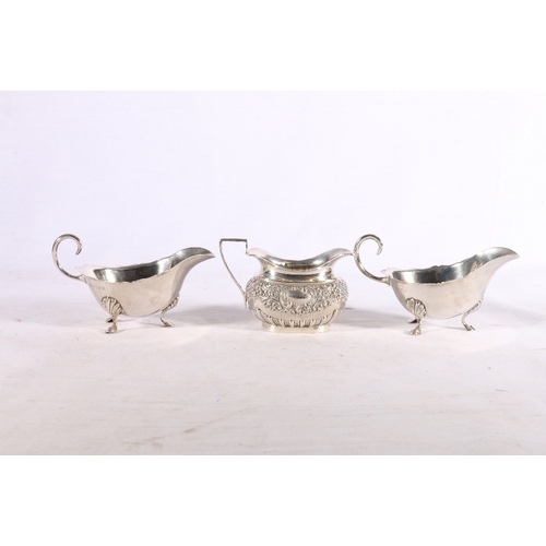 63 - Pair of Edwardian silver cream jugs by William Aitken, Birmingham 1903, 182g and an Edwardian s... 