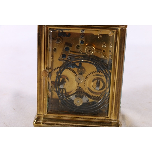 327 - 19th century repeater carriage clock in brass case, the enamel dial with Roman numerals and subsidia... 