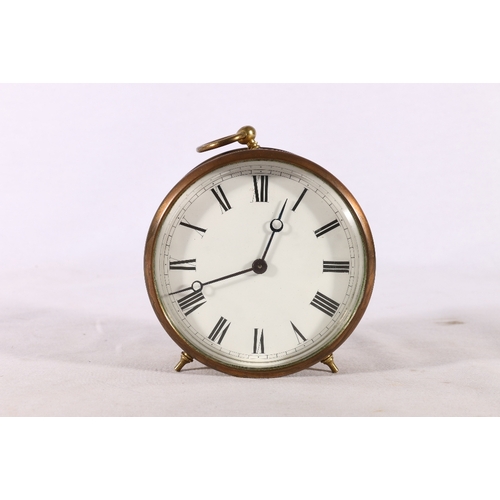 329 - Brass bulk head clock with white enamelled dial having Roman numerals, 10cm diameter