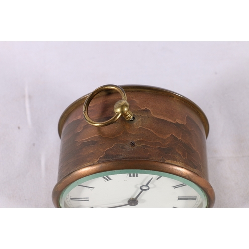 329 - Brass bulk head clock with white enamelled dial having Roman numerals, 10cm diameter