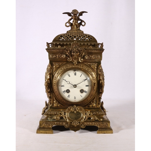 330 - French gilded brass lantern clock with cherub finial decorated with mask, rose, acanthus and other d... 