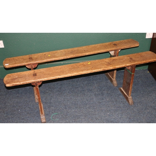 363 - Pair of rustic oak benches with trestle ends, 147cm long