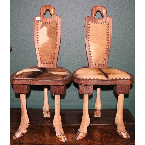 364 - Pair of taxidermy and rosewood stools, the legs formed form deer legs and upholstered in deer skin, ... 