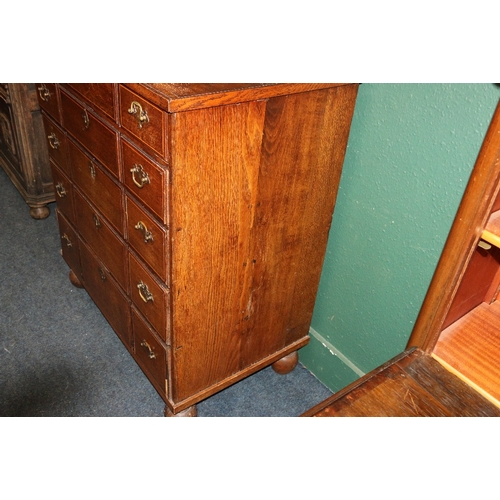 387 - Antique oak and string inlaid chest of drawers, the rectangular top above five graduated long drawer... 