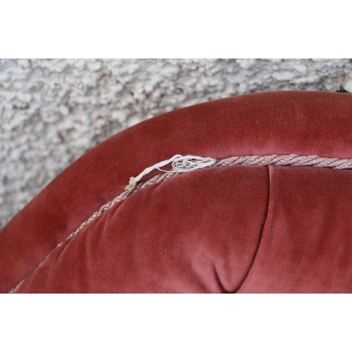 394 - Victorian Ladies chair with bell shaped back upholstered in pink button back fabric raised on ornate... 