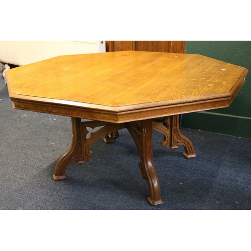 398 - Arts and Crafts Puginesque oak centre or library table with octagonal top, the base with carved and ... 