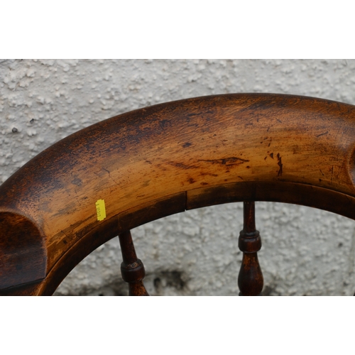 399 - Antique smoker's bow chair with typical yoke back, turned spindle back raised on turned supports&nbs... 