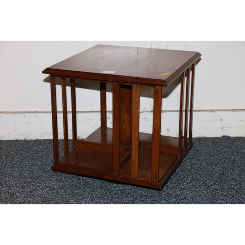 403 - Edwardian mahogany revolving table top bookcase, 35cm square