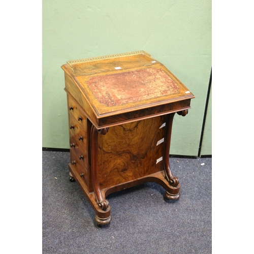 452 - Victorian walnut Davenport desk with pierced brass gallery raised on scroll supports, 81cm tall