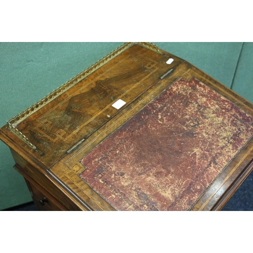 452 - Victorian walnut Davenport desk with pierced brass gallery raised on scroll supports, 81cm tall