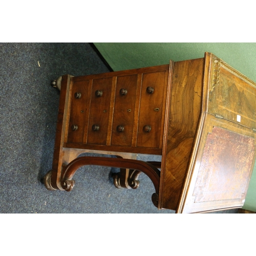 452 - Victorian walnut Davenport desk with pierced brass gallery raised on scroll supports, 81cm tall