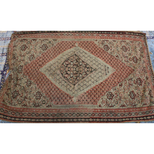 463 - A Kilim rug, floral diamond design, floral spandrel and triple border, 184 x 115cm