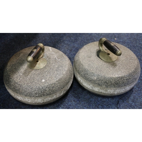 337A - Pair of Scottish granite curling stones, presentation inscription to handle, 28cm diameter.