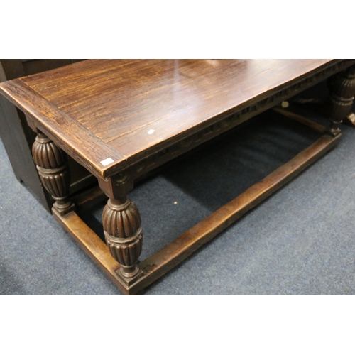 371 - 19th century oak refectory style table with carved frieze raised on turned supports united by under ... 