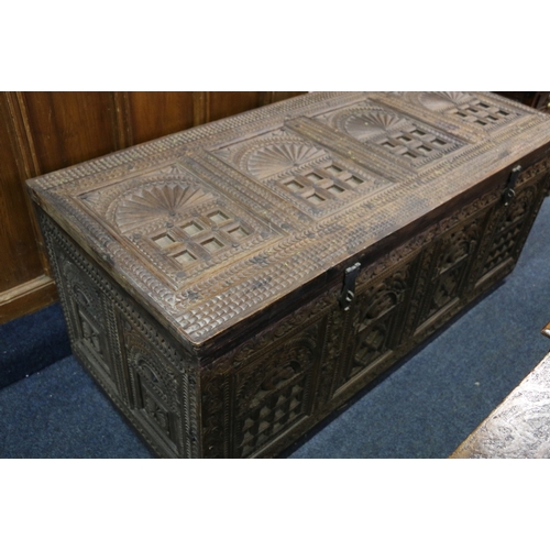 453 - Indian chip carved hardwood dowry style chest of Zanzibar style with hinge top decorated with birds ... 