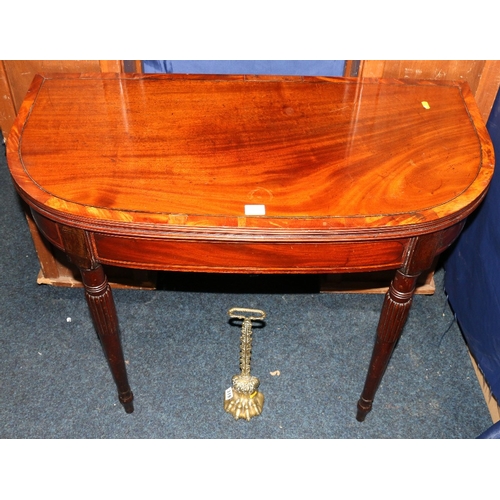 384 - 19th century mahogany and crossbanded demi lune turnover card table raised on turned supports, 89cm ... 