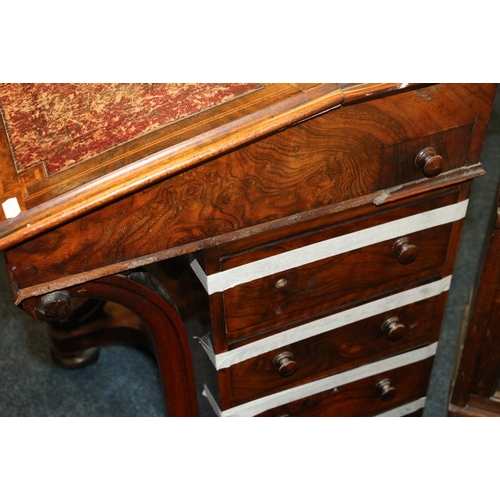 452 - Victorian walnut Davenport desk with pierced brass gallery raised on scroll supports, 81cm tall