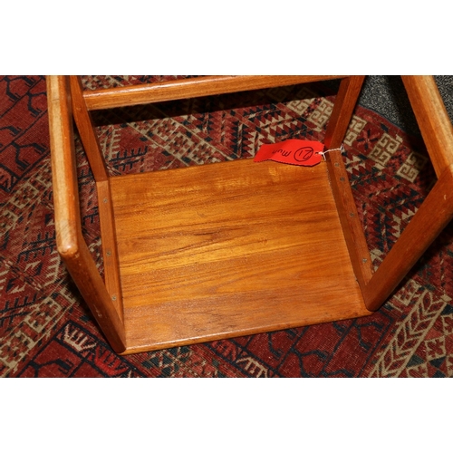 358 - Mid 19th century nest of three teak tables, each with rectangular top, raised on simple legs united ... 