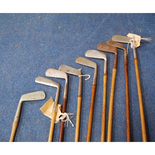 207 - Nine hickory shafted golf clubs including: Schneider, stainless putter; J. Andrew, Bridge of Weir, G... 