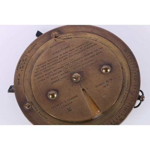 189 - Negretti & Zambra of London weather forecast disc barometer on easel stand, patent number 6276, ... 