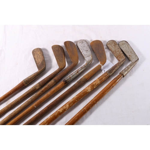 206 - Seven hickory shafted golf clubs including Forgan of St Andrews driving iron, hammer mashie, George ... 