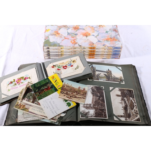 236 - A collection of around 400 postcards including WWI interest, nineteen embroidered silks, Scottish to... 