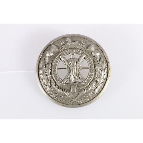 418 - Scottish white metal plaid brooch with design of St Andrew on the cross within thistle wreath, 