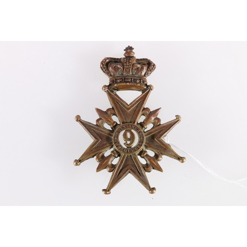 427 - Canadian helmet plate of the 9th Battalion Volunteer Militia Rifles with crown over Maltese cross wi... 