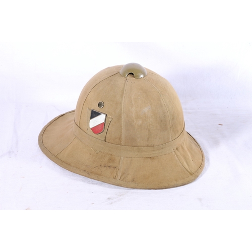 431 - German WWII style pith sun helmet with Wehrmachtadler decal and national shield decal 