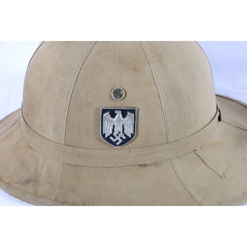 431 - German WWII style pith sun helmet with Wehrmachtadler decal and national shield decal 