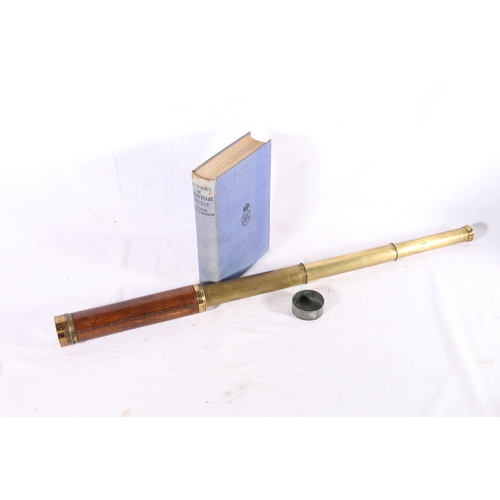 464 - Brass and leather three draw telescope by Dolland of London, the brass inscribed 