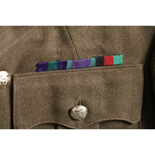 518 - British Army khaki green dress uniform jacket having Jardine and Son Ltd of Forth Street Edinburgh l... 