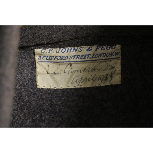 529 - British Army greatcoat or long jacket having C F Johns and Pegg of London label 