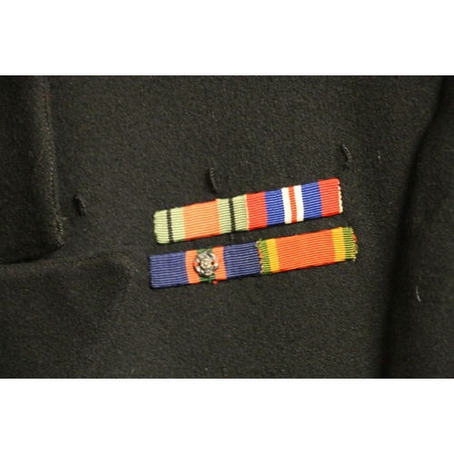 537 - British Royal Navy dress uniform jacket having Gieves of London label 