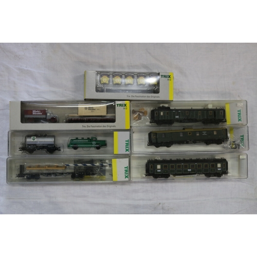 62 - Trix HO scale model railways rolling stock including 23995, 23764, 24072, 23763, 23317, 24817 and 24... 