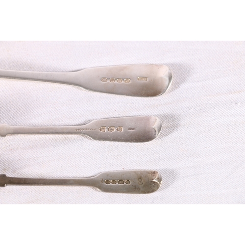 58 - A Pair of Georgian silver table spoons of fiddle pattern by WE, London 1809? with crest monogram, a ... 