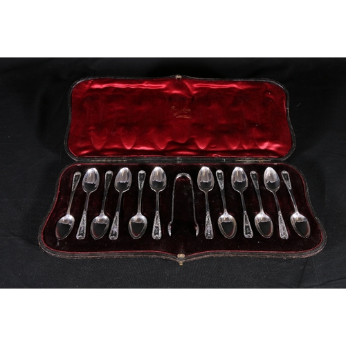 62 - Set of twelve Edwardian Art Nouveau period silver teaspoons and sugar tongs by Josiah Williams ... 