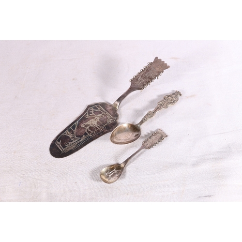 81 - Swedish Sami style silver cake slice decorated with incised reindeer, sleigh and ski designs, makers... 