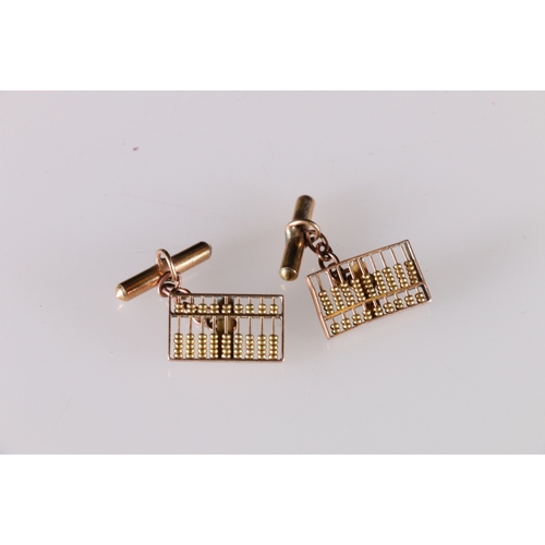 97 - Pair of 18kt gold cuff links in the form of an abacus, 7.48g